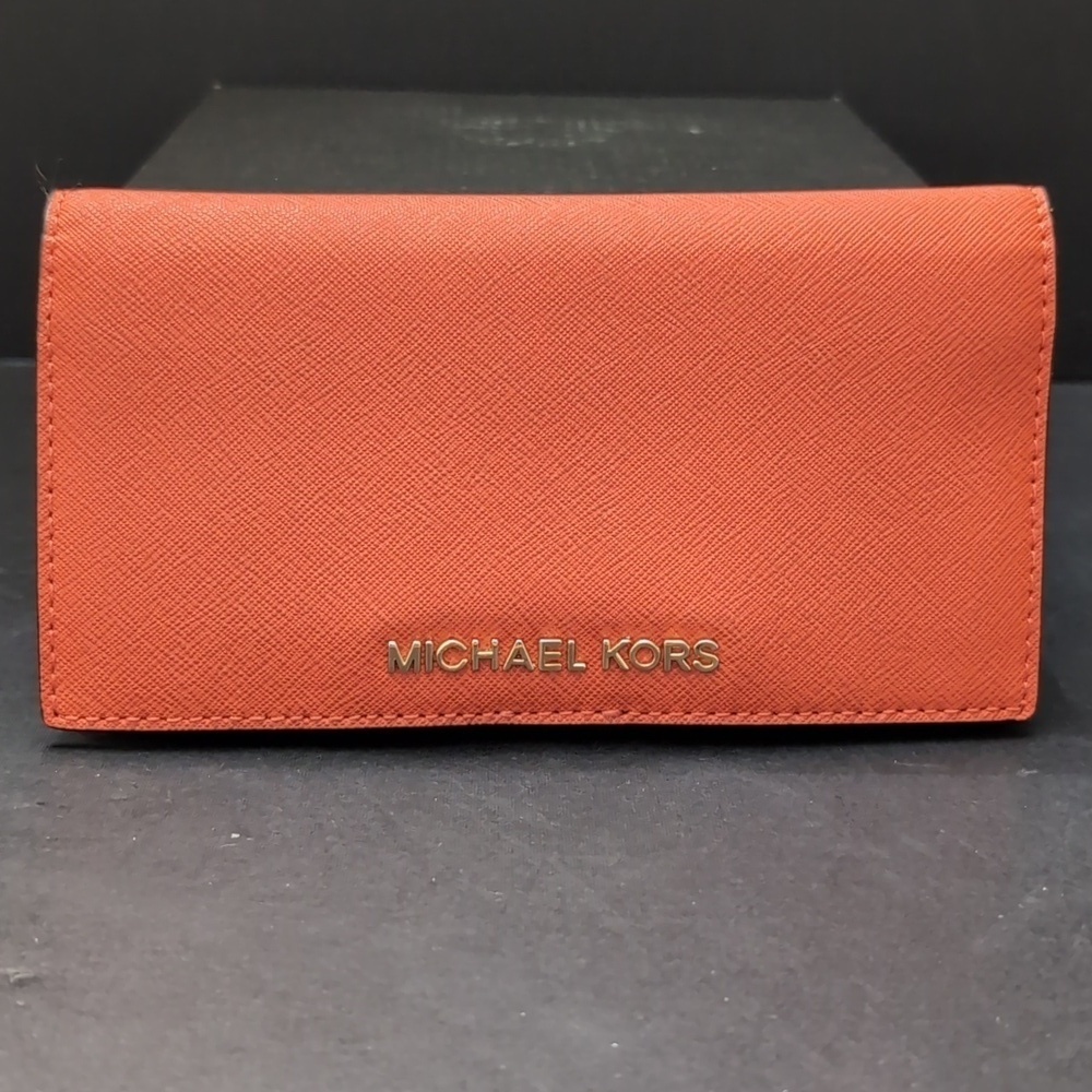 Michael Kors Women's Orange Leather Jet Set Slim Travel Wallet.